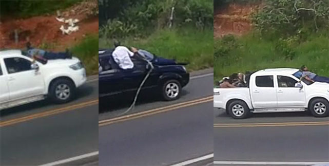 Reféns foram amarrados na frente dos carros (Foto: Reprodução)