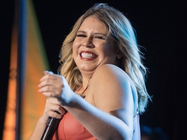 Fitness, Marília Mendonça mostra calça larga após meses de treino.