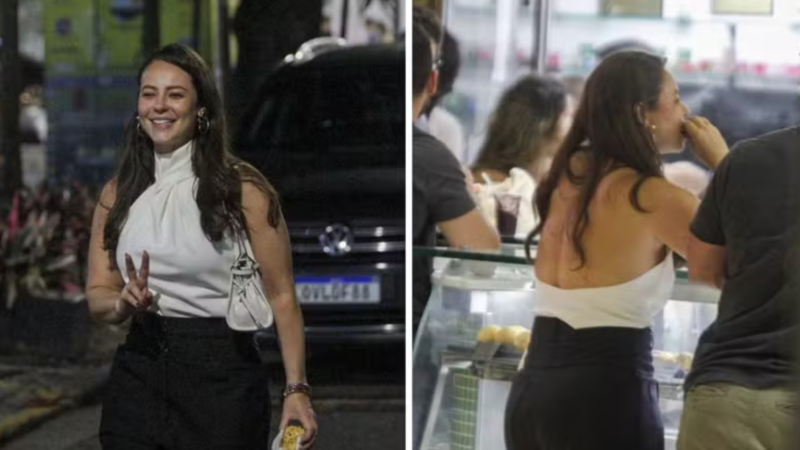 Paolla Oliveira come coxinha para encerrar a noite e ajuda família que trabalhava no local