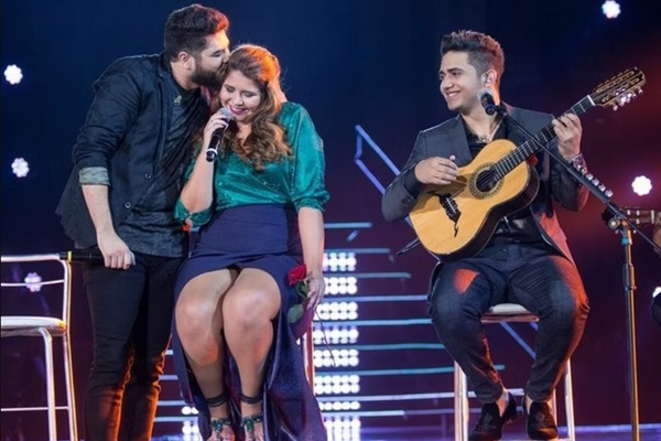 Tributo a Marília: Henrique e Juliano insinuam “coisas de bastidores”