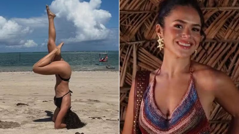 De biquíni, Maisa mostra equilíbrio ao ficar de ponta cabeça em praia de Alagoas