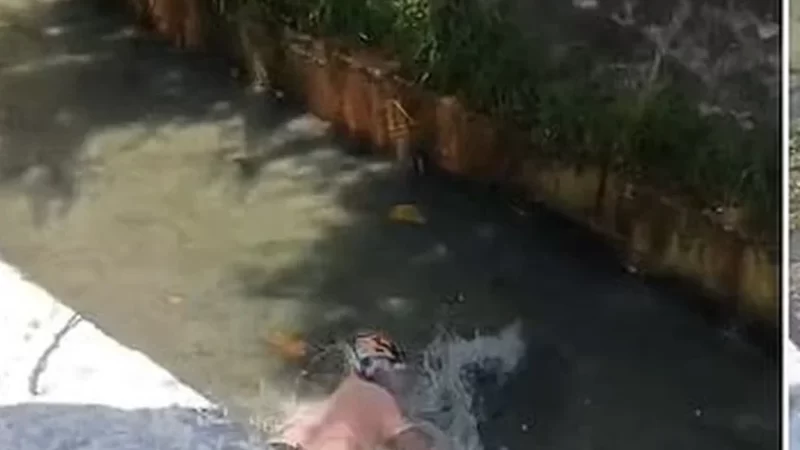 Suspeito de tentar roubar moto pula em vala de riacho para não apanhar de populares